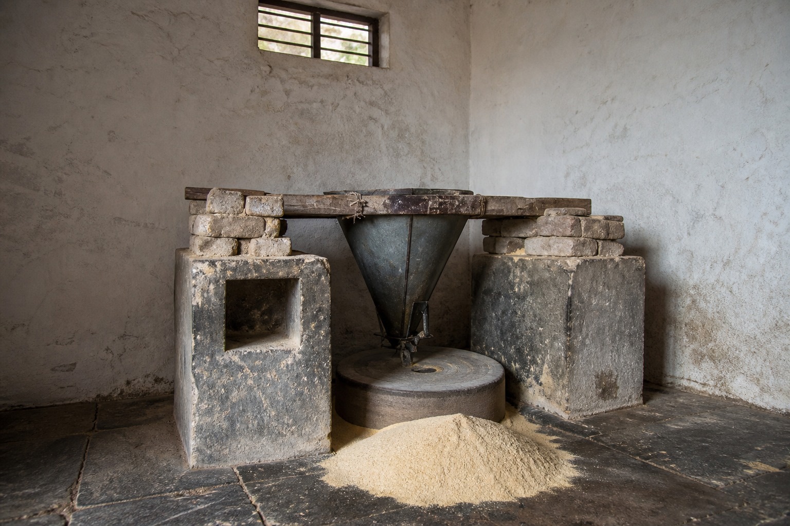 Traditional chakki — atta on the floor